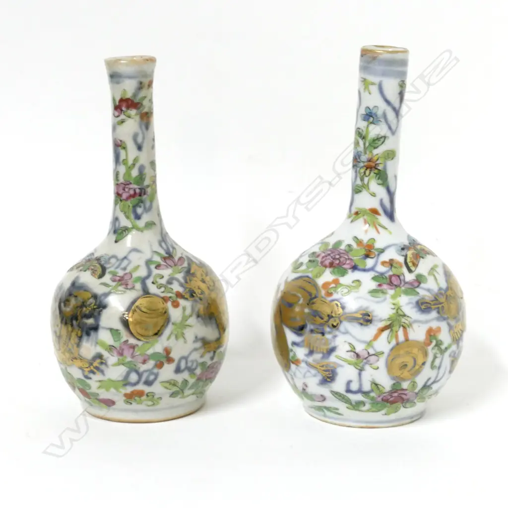 A pair of famille rose bottle vases Image 1++