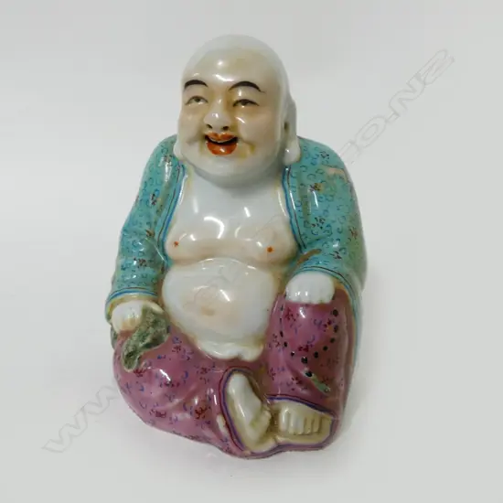 A small Chinese famille rose porcelain figure of Hotei