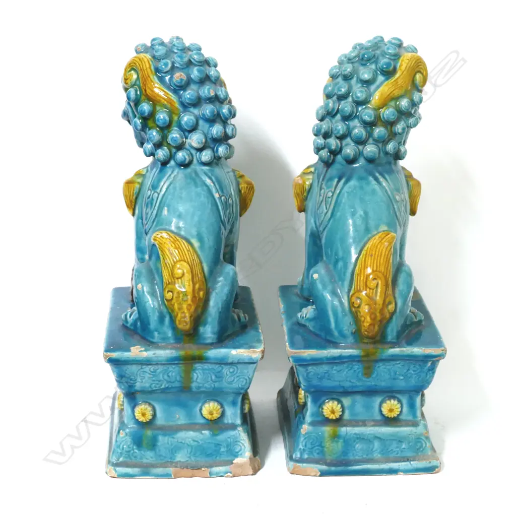 A pair of old Chinese glazed pottery kylins on plinth bases Image 1++