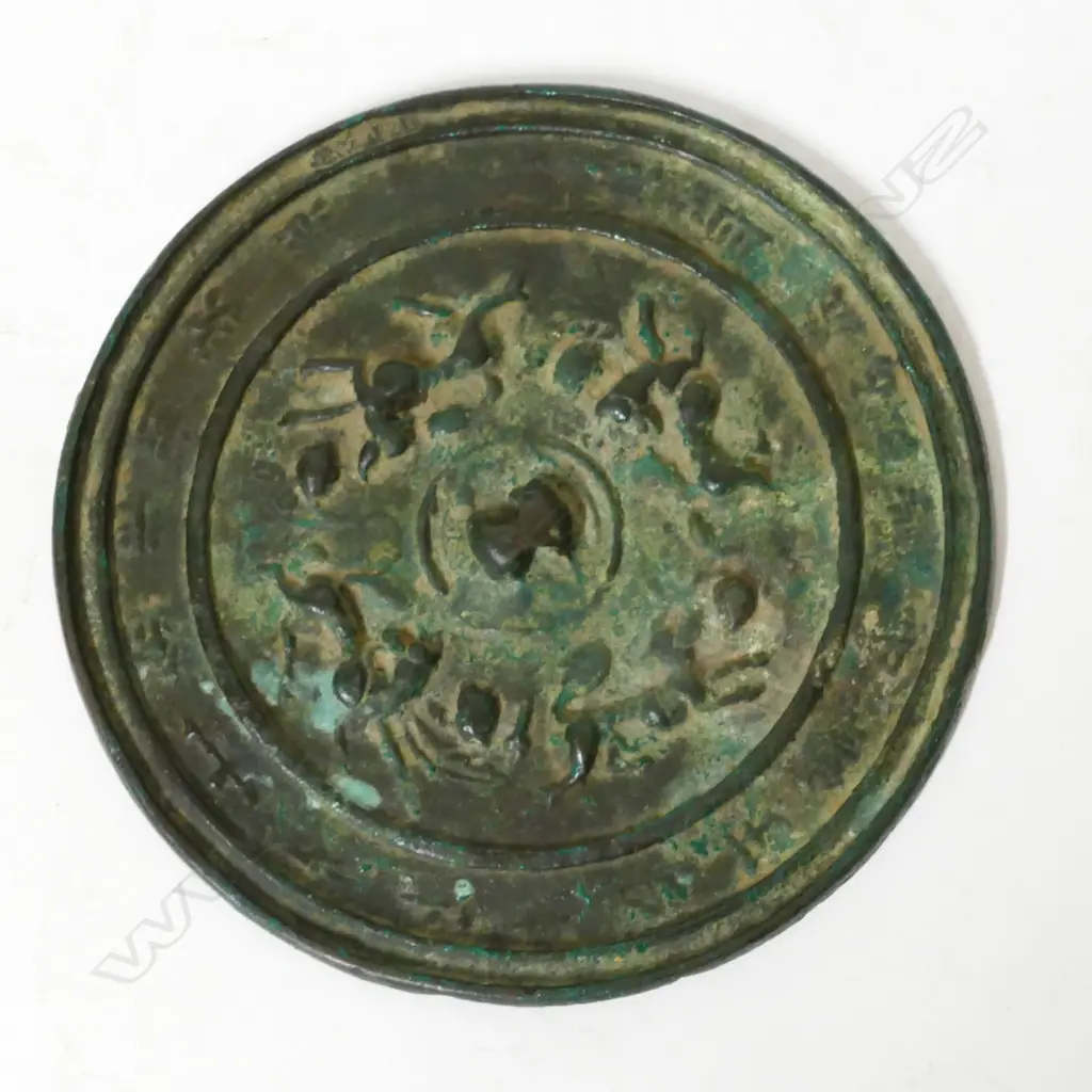 An early Chinese bronze mirror Image 1++