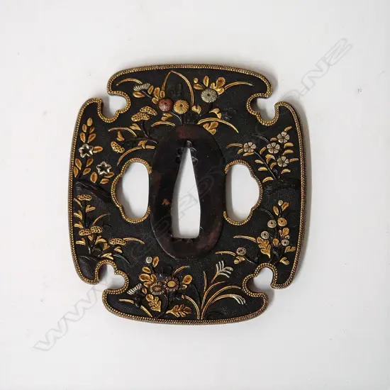 A fine quality Japanese Edo period (1603-1868) tachi tsuba (sword guard)