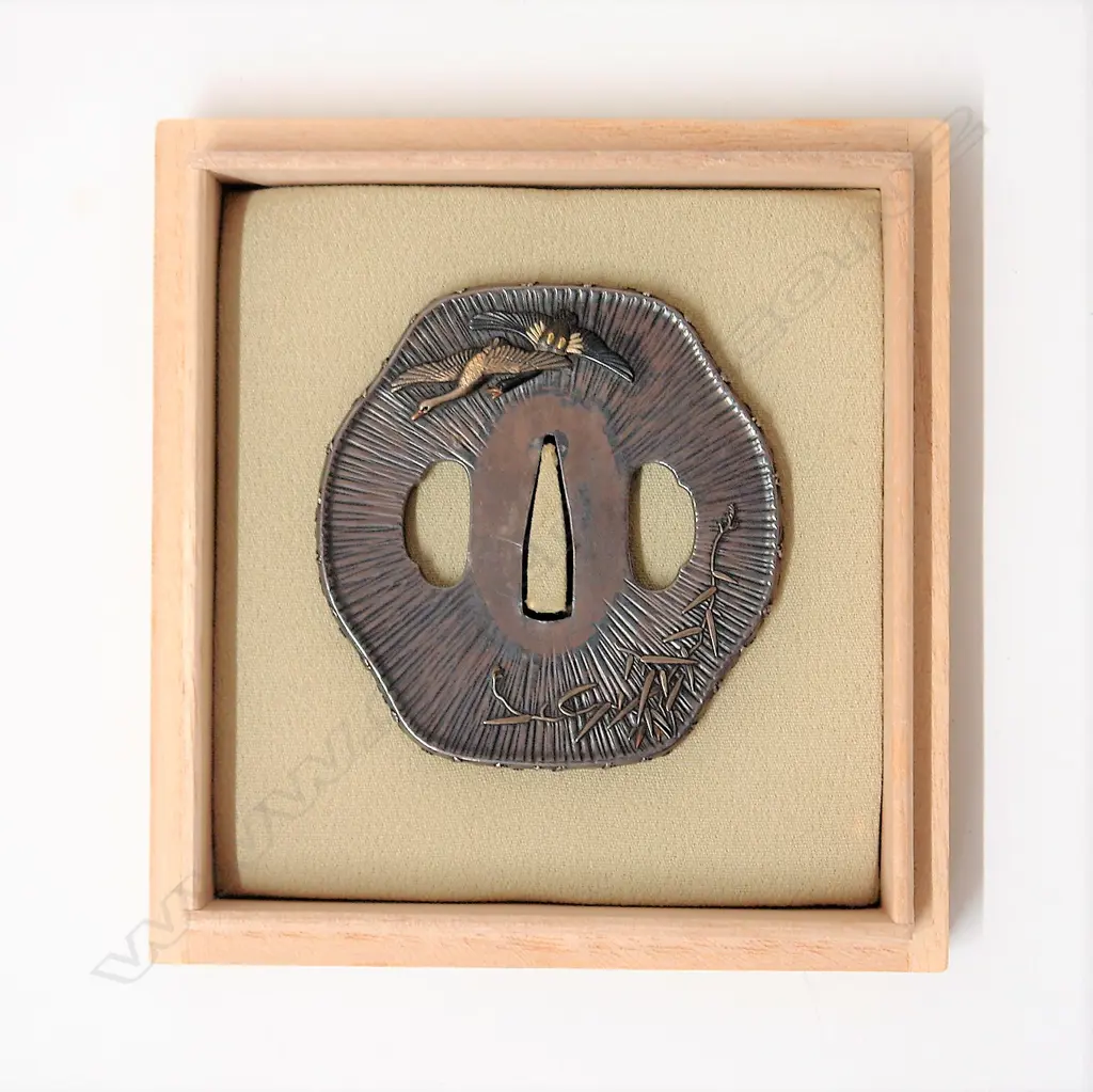 A fine and rare Japanese silver sword tsuba Image 1++