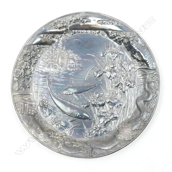 A large good quality Japanese white metal circular charger