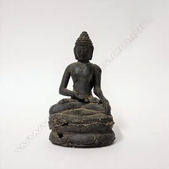 An old Indonesian bronze seated Buddha