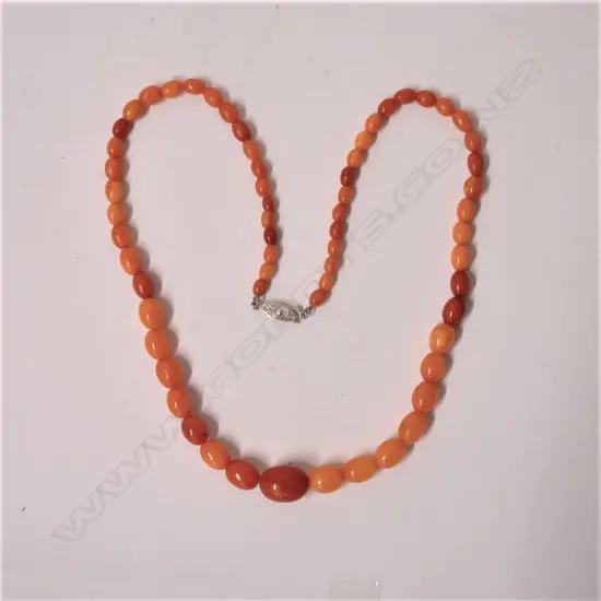 A vintage butterscotch amber bead necklace