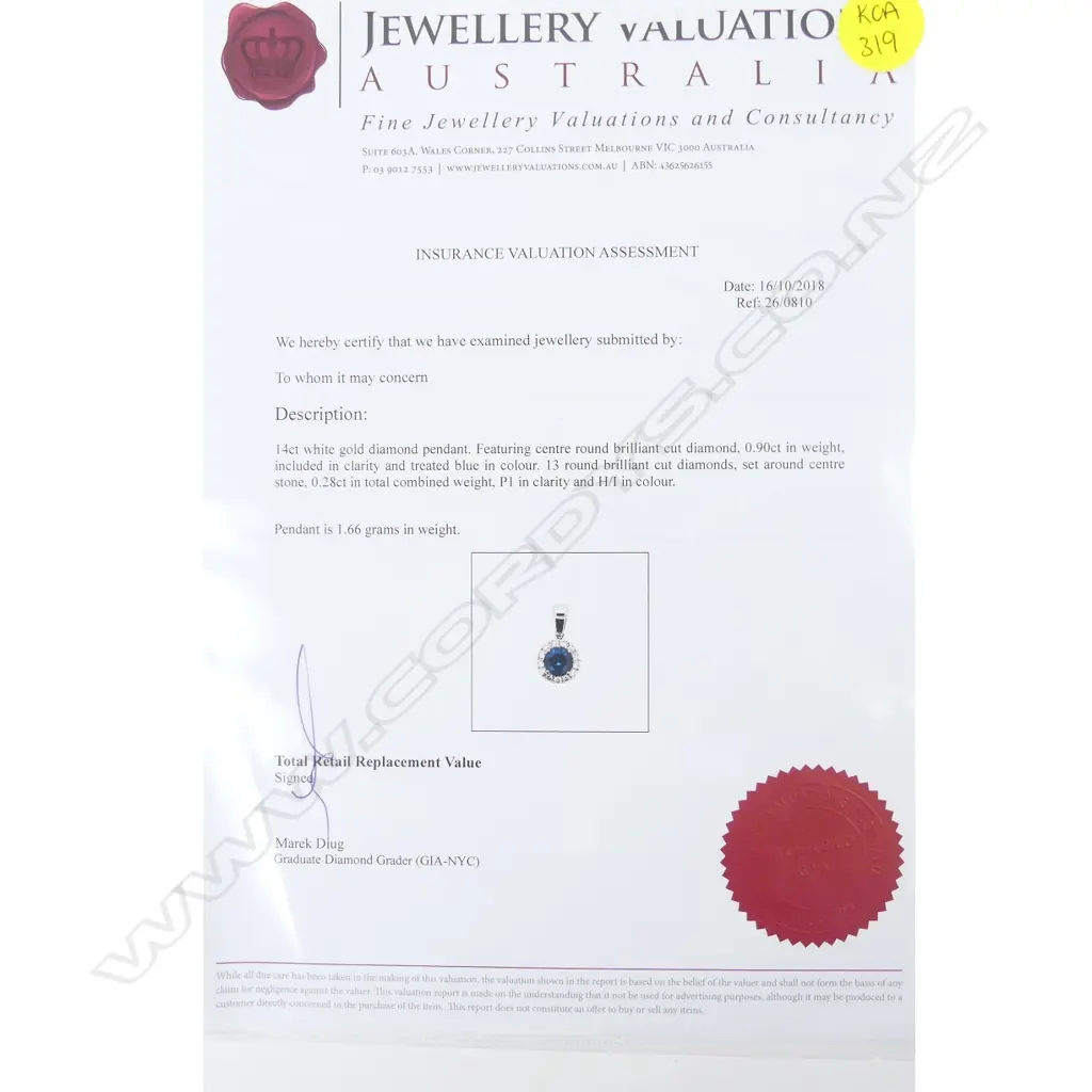 A 14ct. white gold and diamond pendant Image 1++