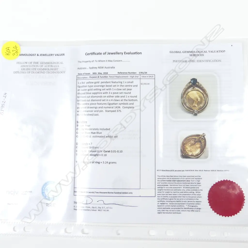 A 9ct. gold diamond and sapphire set pendant Image 1++