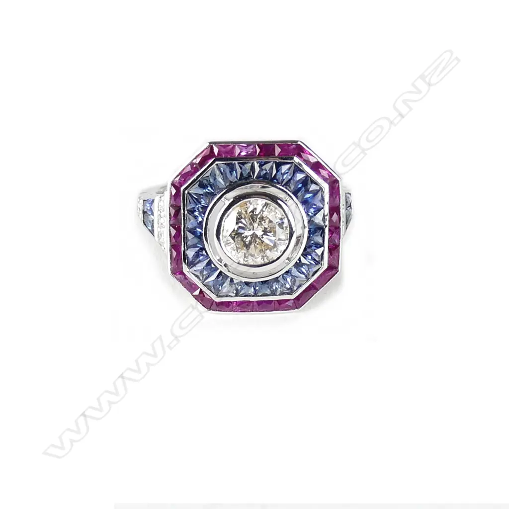 An 18ct. white gold diamond ruby and sapphire Art Deco style ring Image 1++