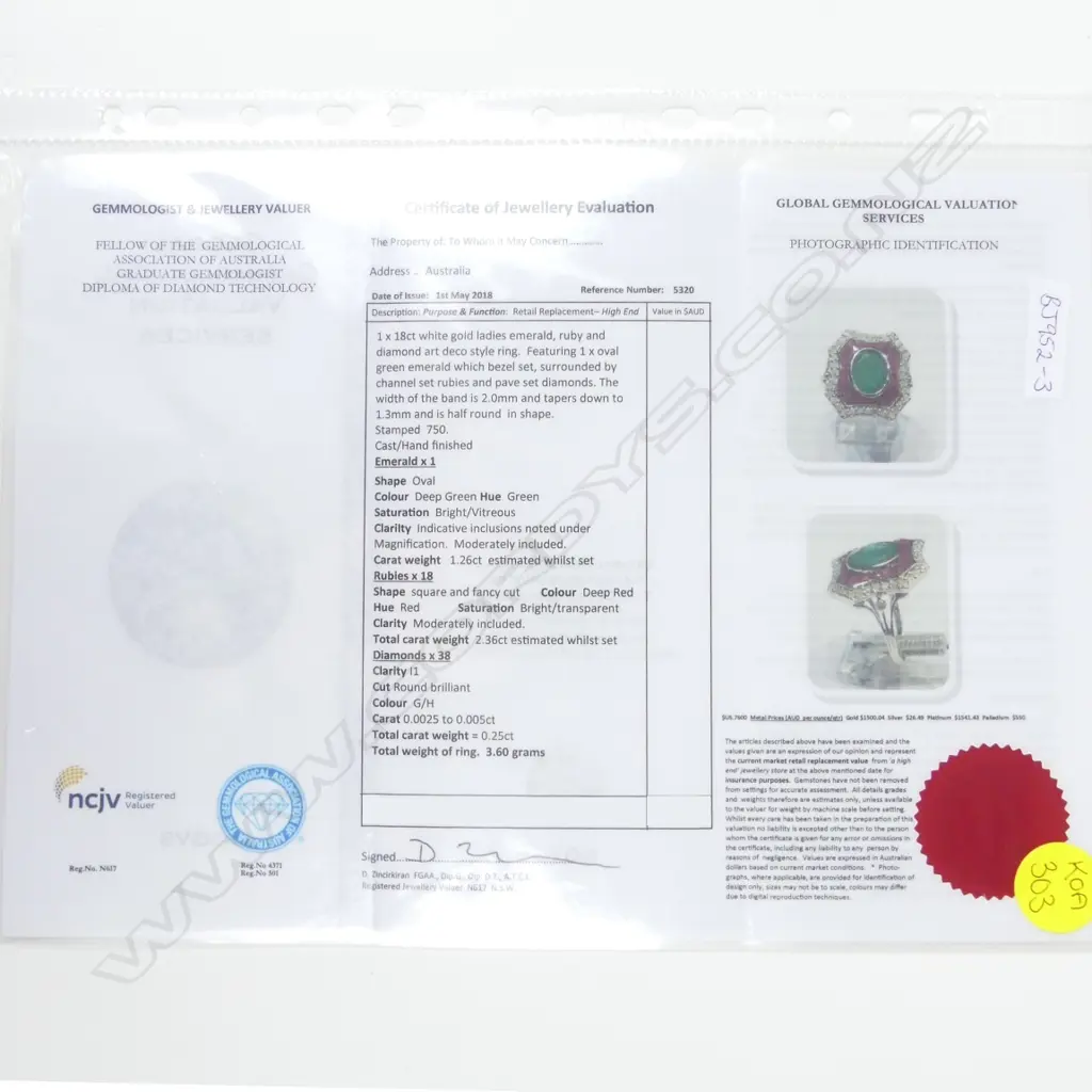 An 18ct. white gold emerald ruby and diamond Art Deco style ring Image 1++