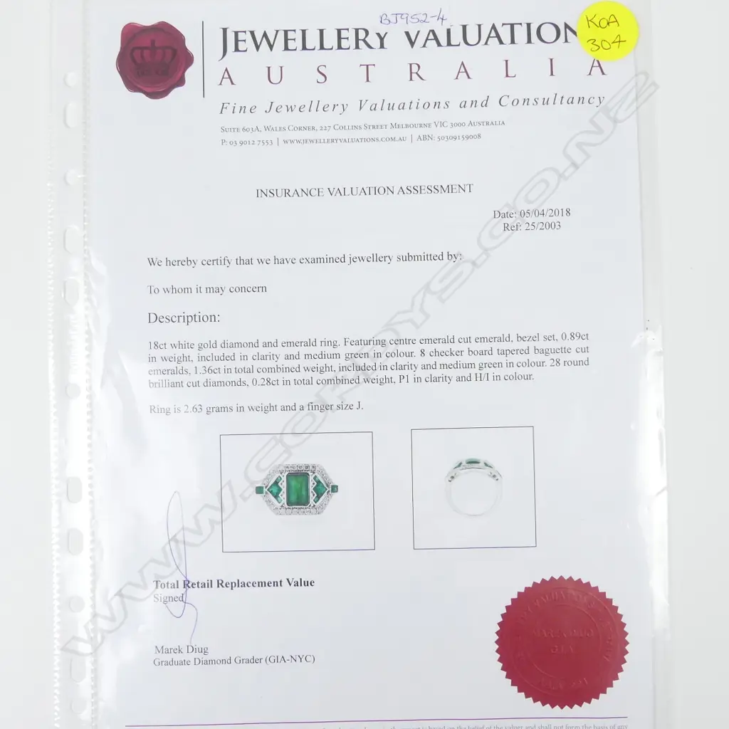 An 18ct. white gold emerald and diamond Art Deco style ring Image 1++