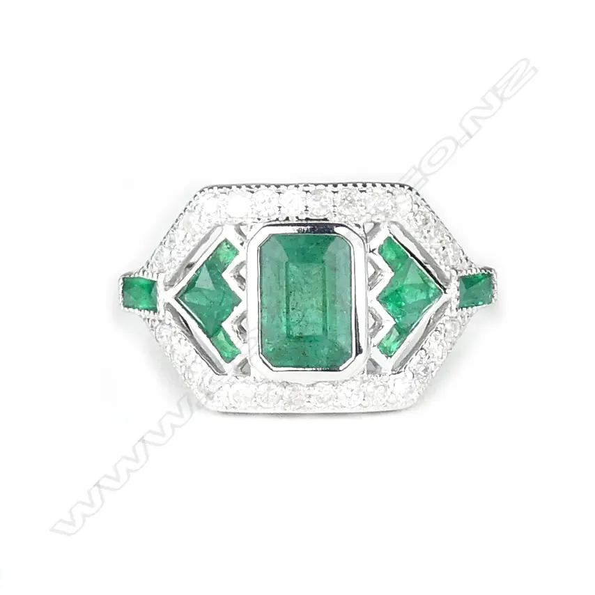 An 18ct. white gold emerald and diamond Art Deco style ring Image 1++
