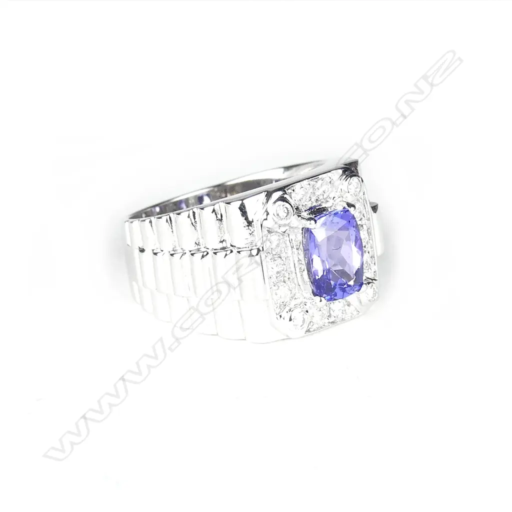 A 14ct. white gold tanzanite and diamond gent's ring Image 1++