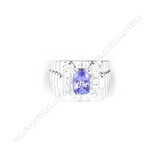 A 14ct. white gold tanzanite and diamond gent's ring
