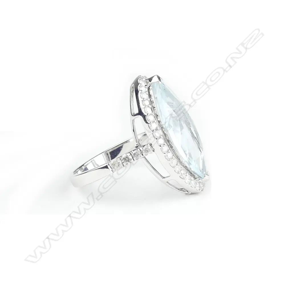A 14ct. white gold aquamarine and diamond ring Image 1++