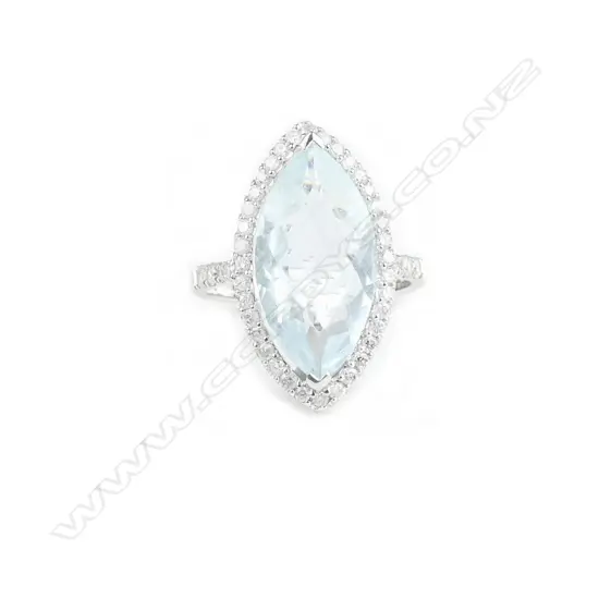 A 14ct. white gold aquamarine and diamond ring