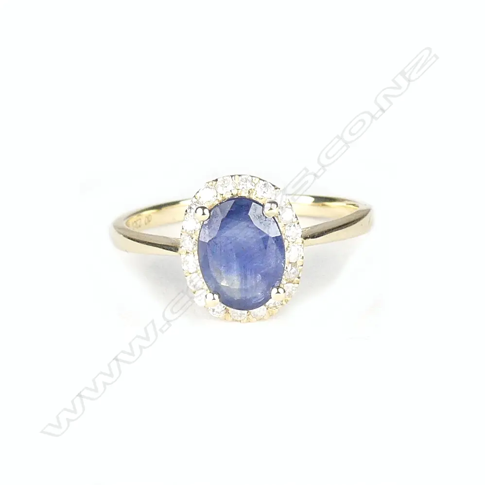 A 14ct. yellow gold sapphire and diamond ring Image 1++