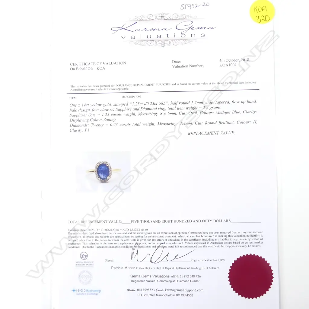 A 14ct. yellow gold sapphire and diamond ring Image 1++