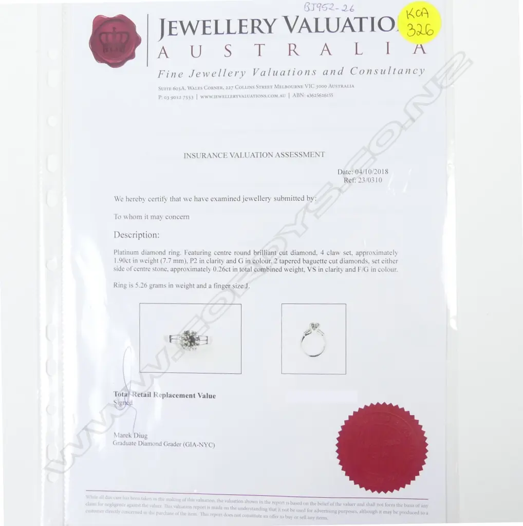 A platinum and diamond solitaire ring Image 1++