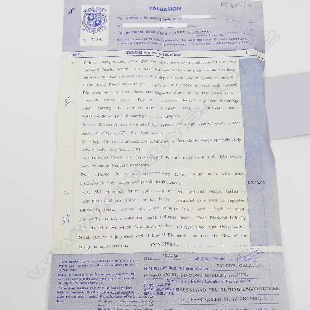 An impressive 14ct. white gold diamond and pearl ring and earrings suite Image 1++