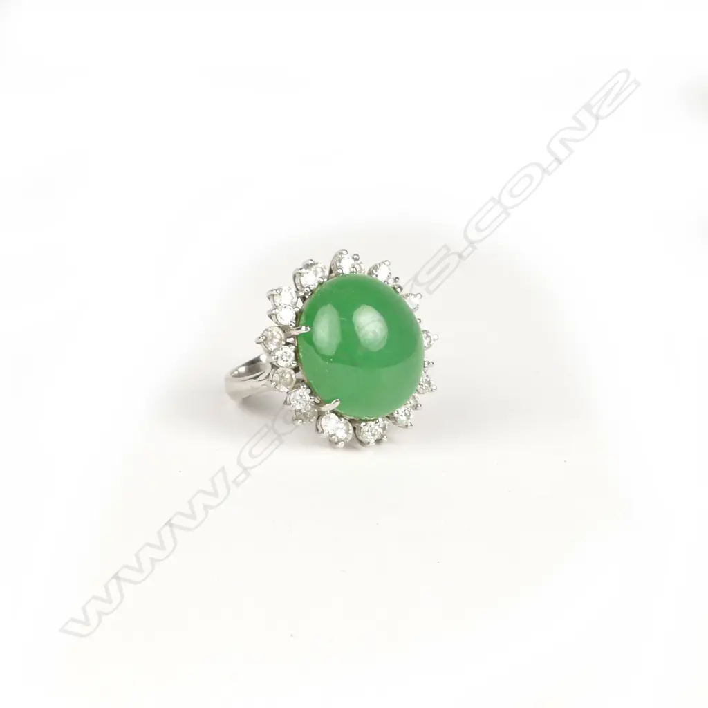 A platinum jade and diamond ring Image 1++