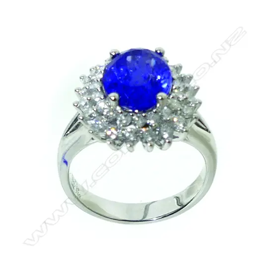 An 18ct. white gold tanzanite and diamond ring