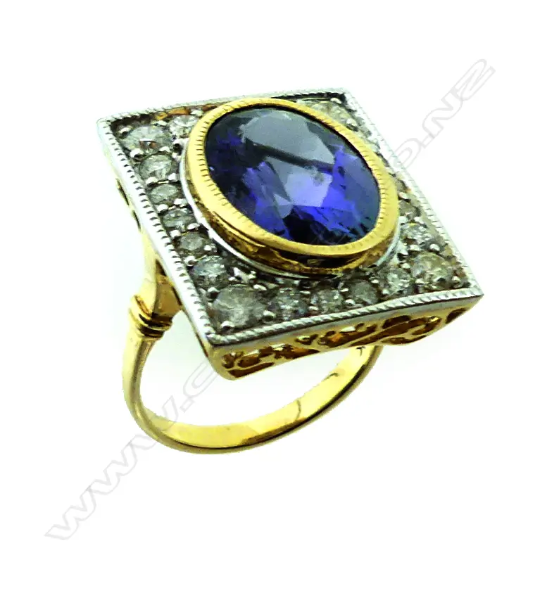 A 14ct. gold tanzanite and diamond Art Deco style ring Image 1++