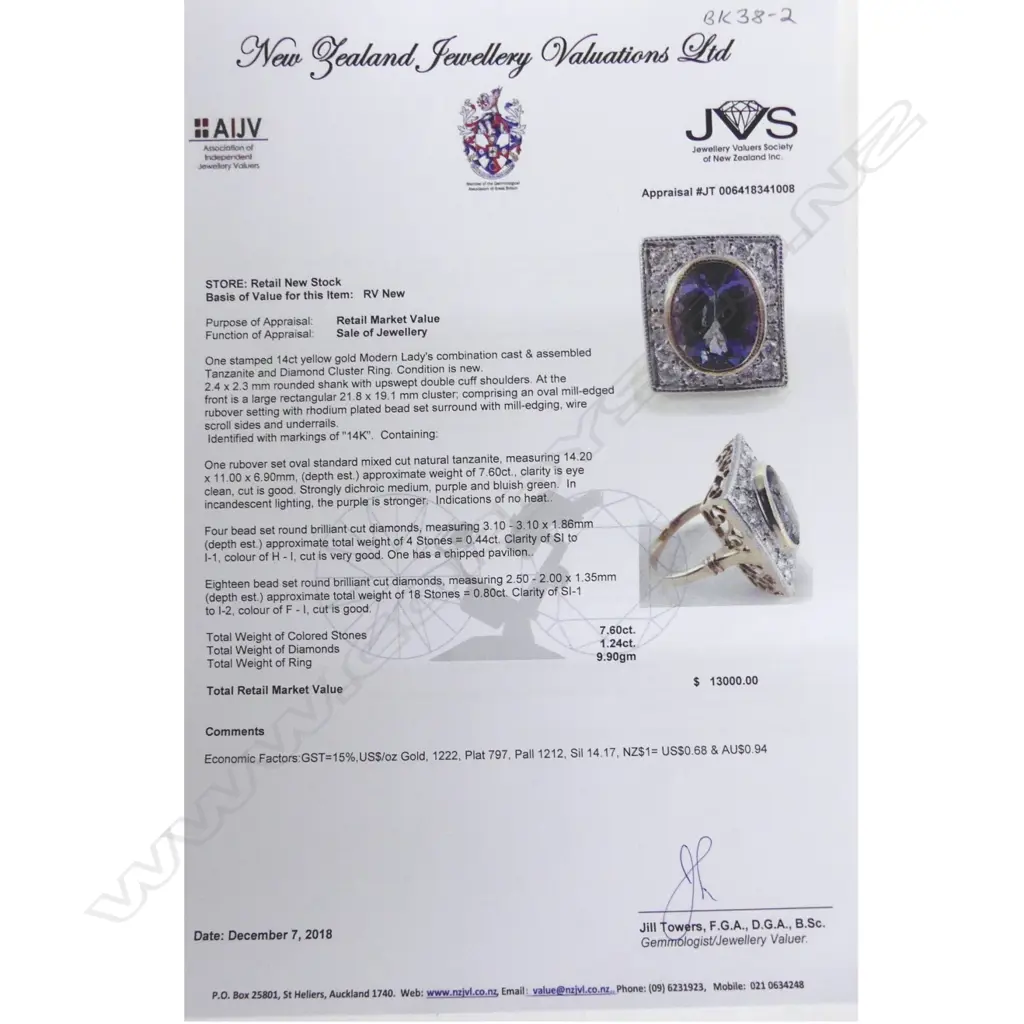 A 14ct. gold tanzanite and diamond Art Deco style ring Image 1++