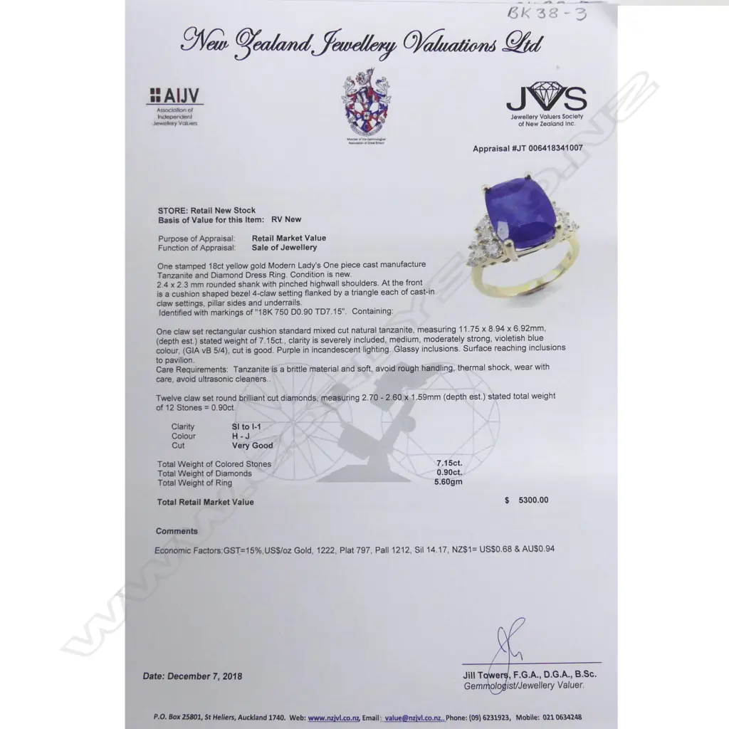 An 18ct. gold tanzanite and diamond ring Image 1++