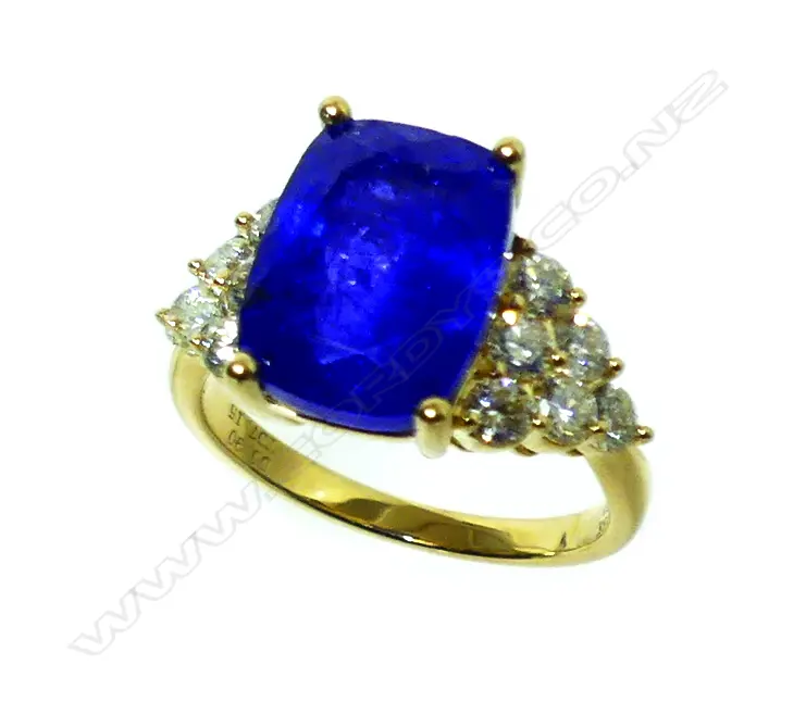 An 18ct. gold tanzanite and diamond ring Image 1++