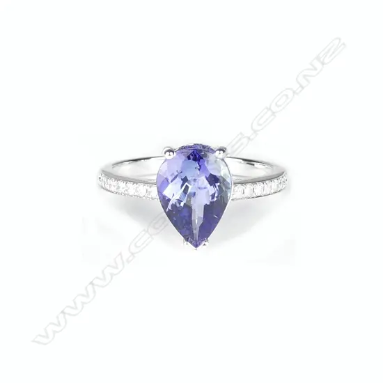 A 14ct. white gold tanzanite and diamond ring