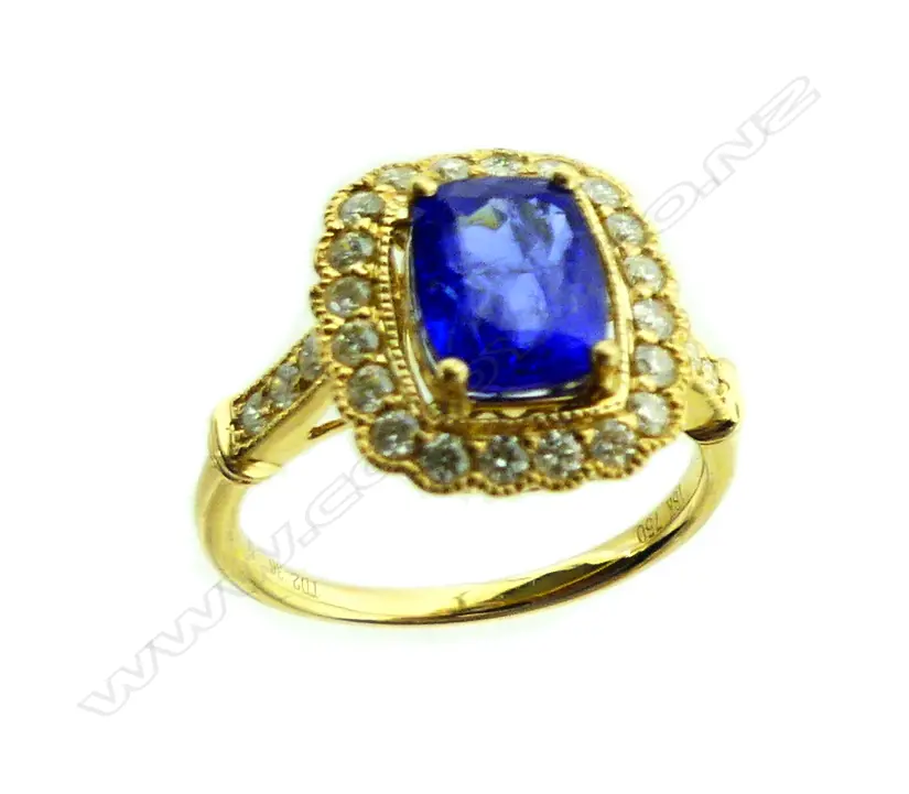 An 18ct. gold tanzanite and diamond ring Image 1++