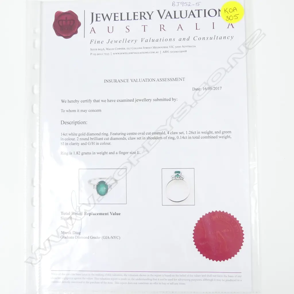 A 14ct. white gold emerald and diamond ring Image 1++