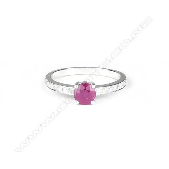A 14ct. white gold and ruby ring
