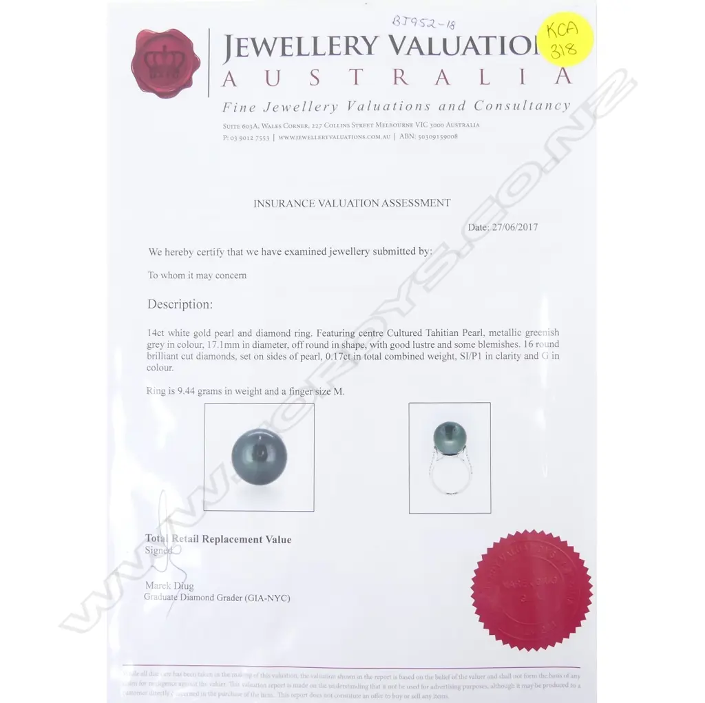 A 14ct. white gold pearl and diamond ring Image 1++