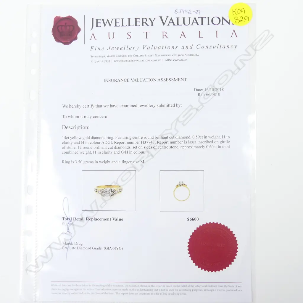 A 14ct. gold and diamond ring Image 1++