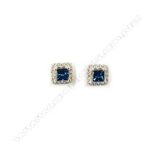 A pair of 14ct. gold and diamond stud earrings