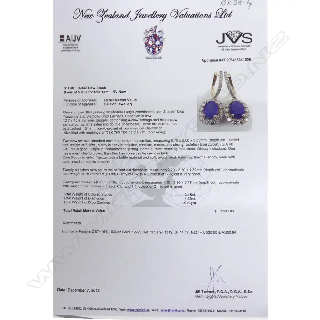 A pair of 18ct. gold tanzanite and diamond earrings Image 1++