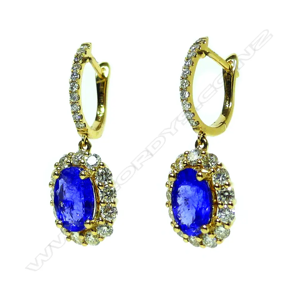 A pair of 18ct. gold tanzanite and diamond earrings Image 1++