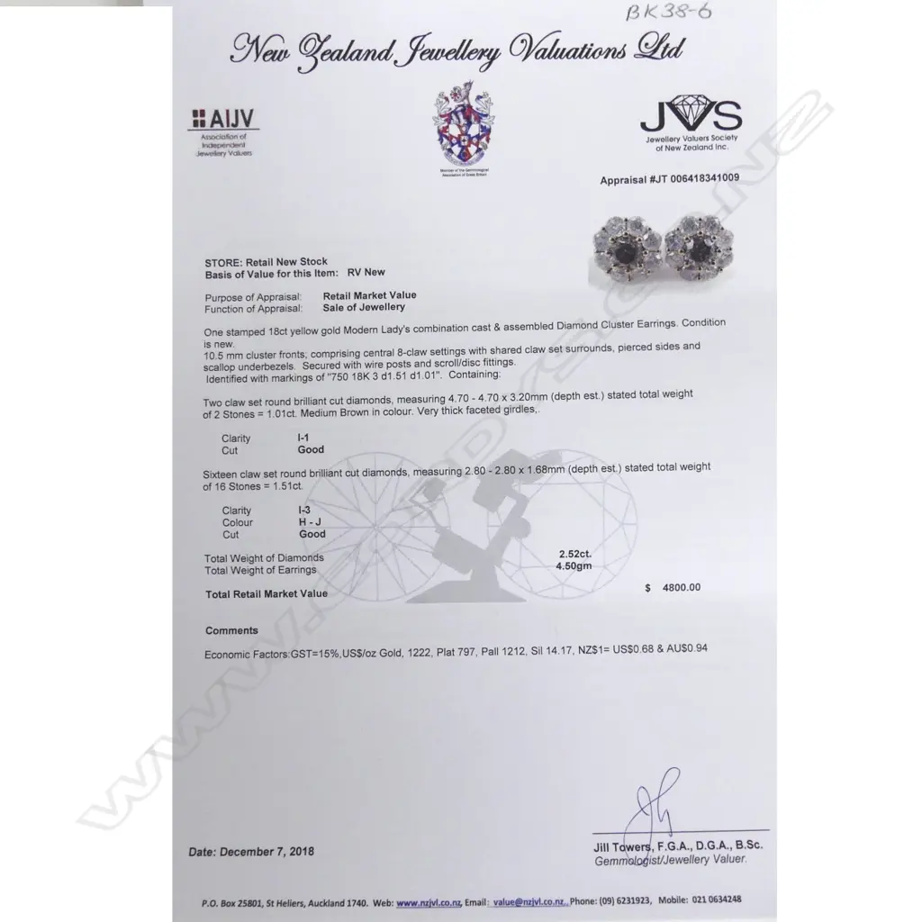 A pair of 18ct. gold and diamond stud earrings Image 1++