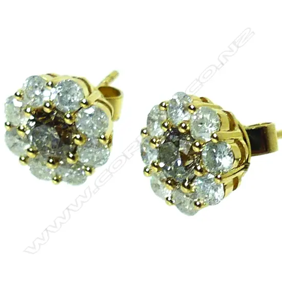 A pair of 18ct. gold and diamond stud earrings