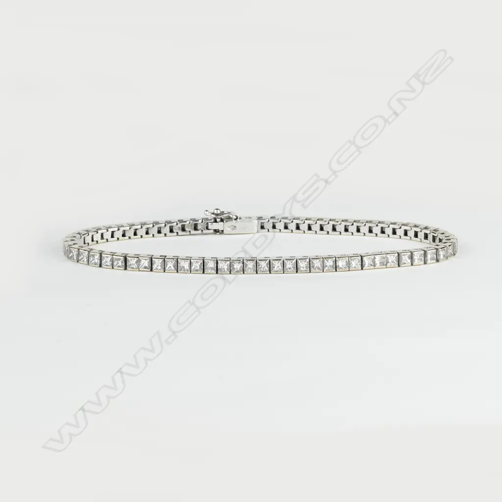 A 9ct. white gold and diamond tennis bracelet Image 1++