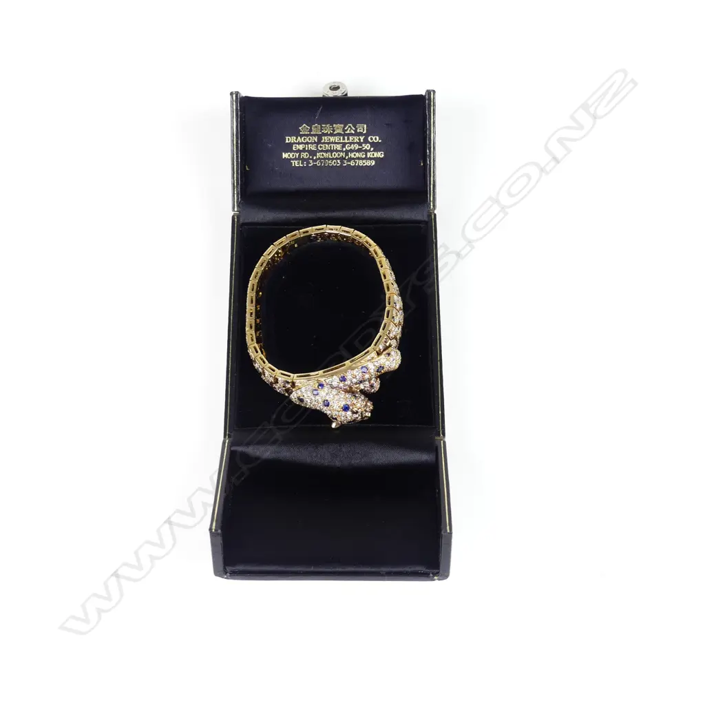 An impressive 18ct. gold diamond sapphire and ruby bracelet Image 1++