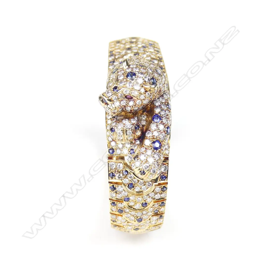 An impressive 18ct. gold diamond sapphire and ruby bracelet Image 1++