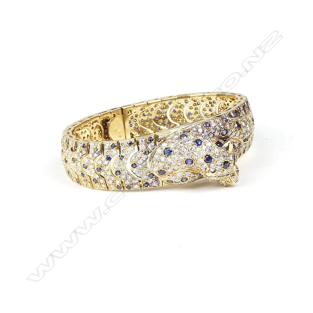 An impressive 18ct. gold diamond sapphire and ruby bracelet Image 1++