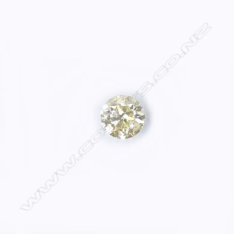 A 0.51ct round brilliant cut fancy yellow diamond Image 1++