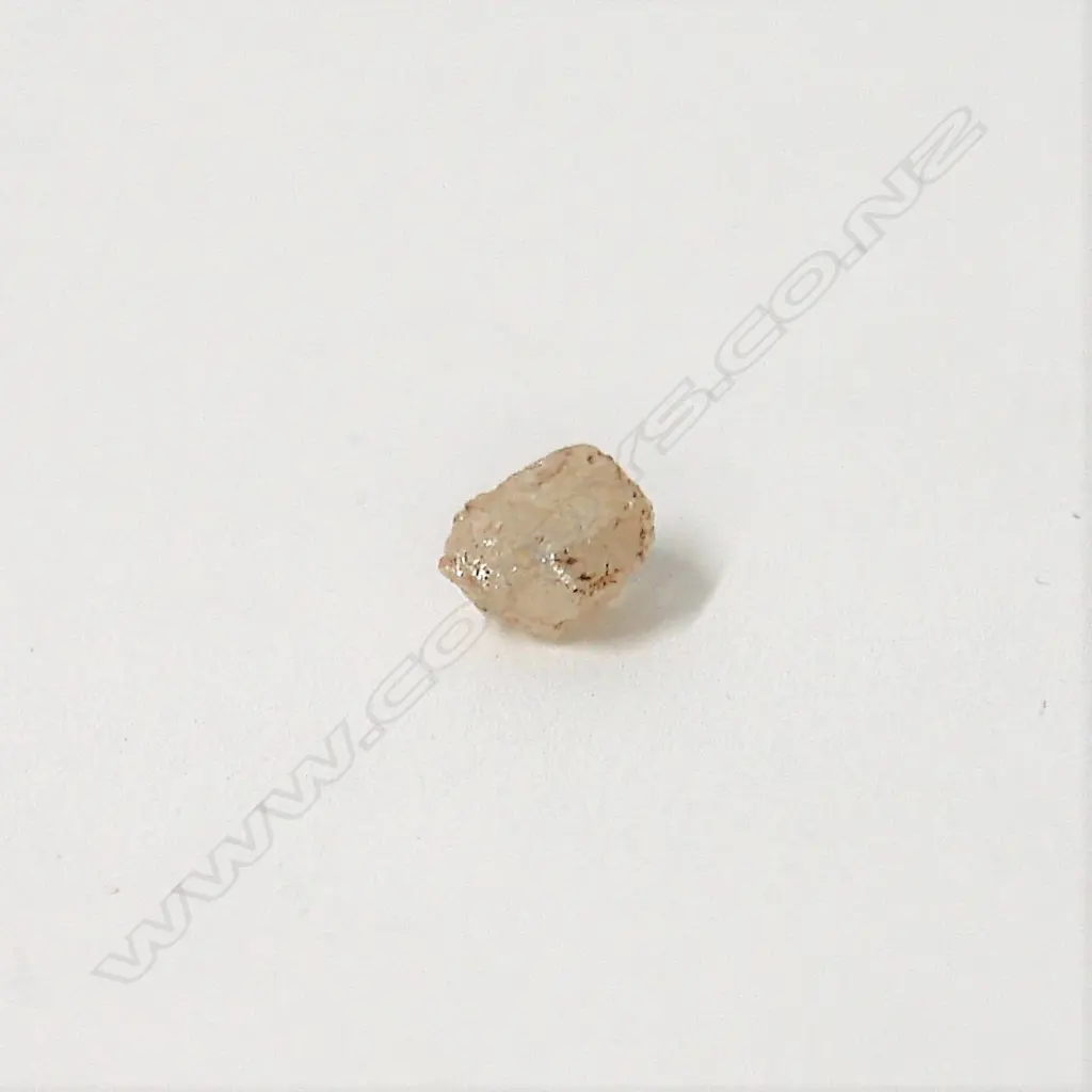 A 1.85ct. rough diamond Image 1++