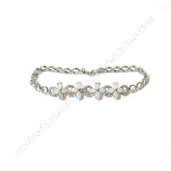 An 18ct. white gold opal and diamond bracelet