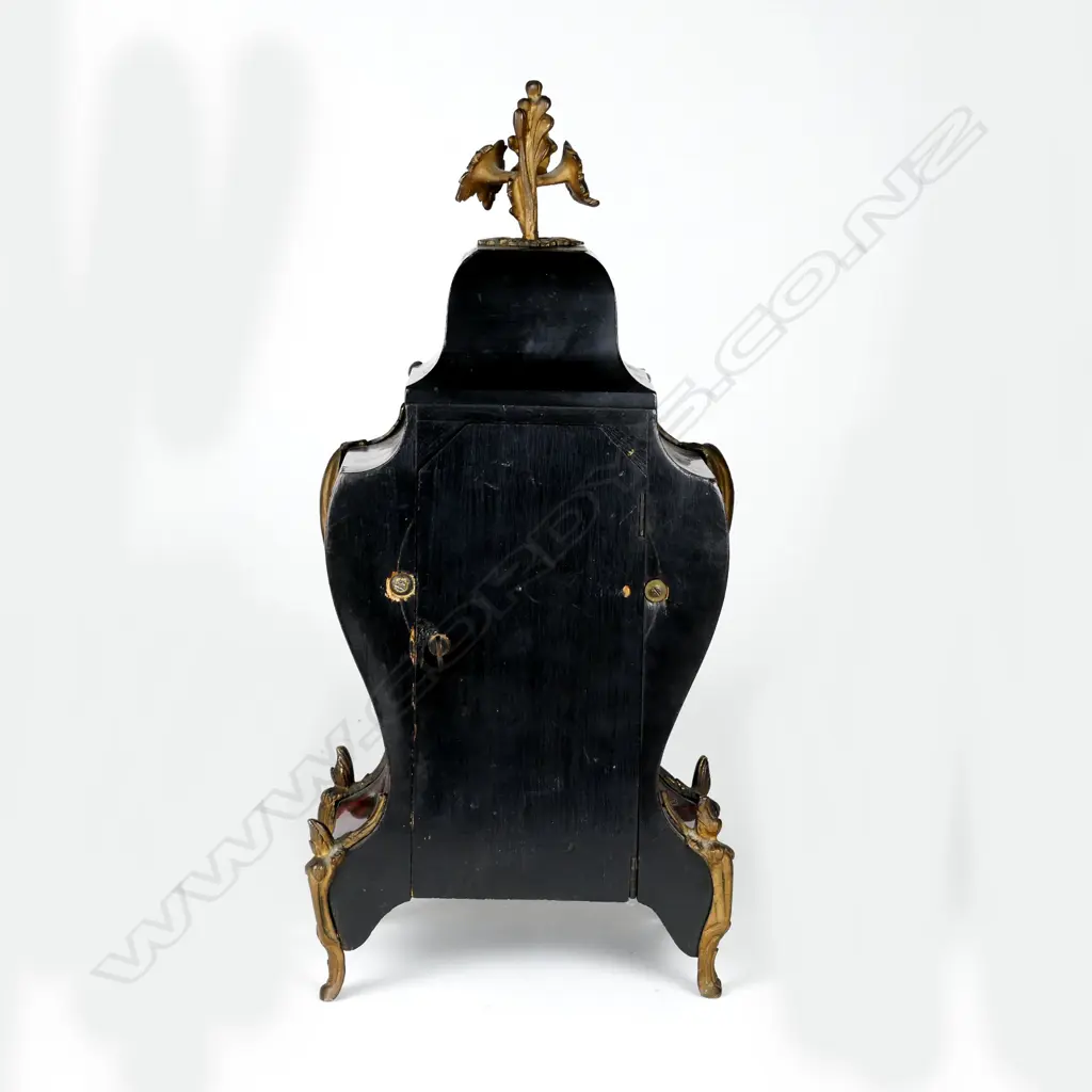 A French simulated red tortoiseshell cased mantel clock Image 1++