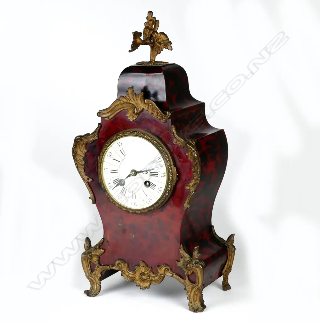 A French simulated red tortoiseshell cased mantel clock Image 1++