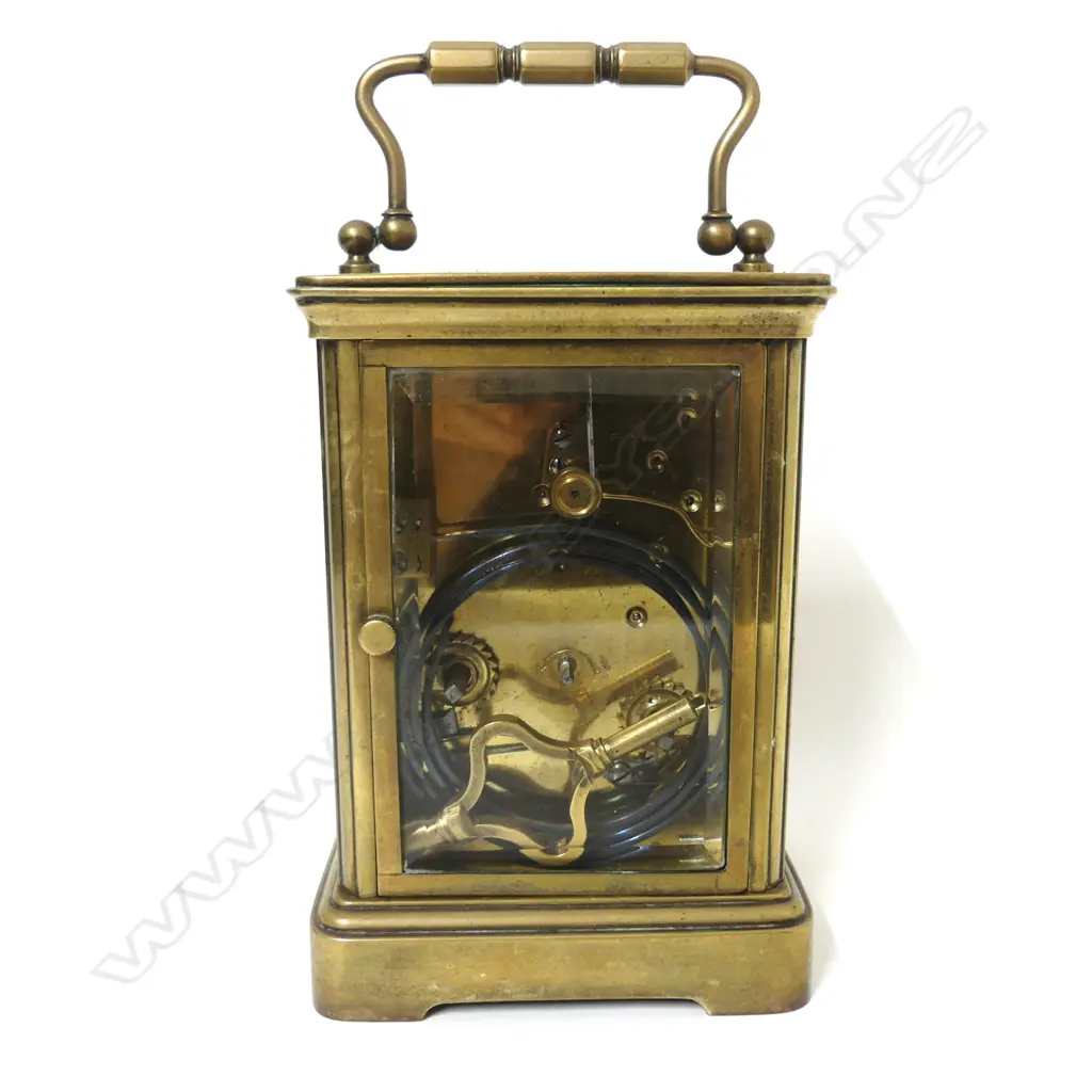 A good late 19thC French glass cased striking carriage clock Image 1++